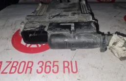 Блок управления двигателем для Porsche Cayenne 2009 года на фотографиях