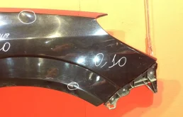 Крыло левое для Opel Astra 2008 года на фотографиях