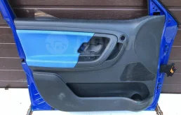 Обшивка (карта) двери передней левой Skoda Fabia II (2007—2010)