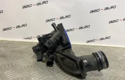 Корпус термостата системы охлаждения ДВС для Citroen C5 2012 года на фотографиях