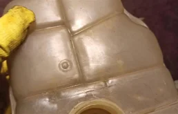 Расширительный бачок радиатора для Opel Astra 2015 года на фотографиях