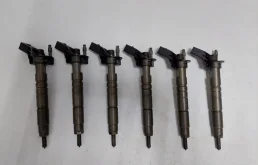 Крышка форсунки фароомывателя левая для Mercedes-Benz M class на фотографиях