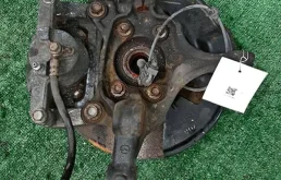 Кулак поворотный левый для Mazda CX 5 2011 года на фотографиях