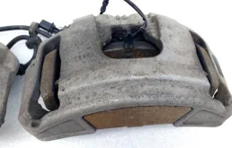 Скоба суппорта передняя для Audi A8 на фотографиях