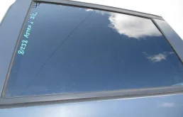 Стекло двери задней левой Opel Astra J