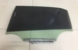 Стекло двери задней левой Toyota Corolla E150 2006-2013