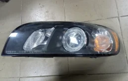 Фара галогеновая Volvo 30698873, левая