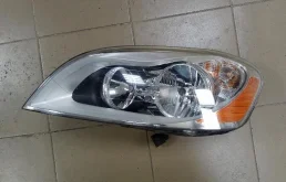 Фара галогеновая Volvo 31395468, левая