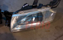 Фара левая для Mitsubishi Chariot Grandis N84W N94W 1997-2003