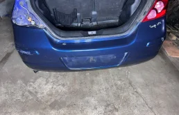 Бампер задний Nissan Tiida C11 Хэтчбек