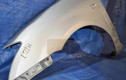 Крыло левое для Toyota Corolla 2005 года на фотографиях