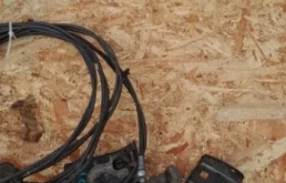 Трос замка капота для Nissan Almera Classic на фотографиях