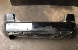Бампер Mazda CX-7 2006-2010 EG2150221, задний