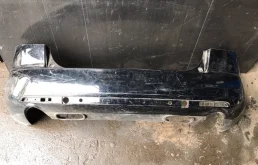 Бампер Mazda CX-7 2006-2012 EG2150221, задний