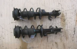 Амортизатор передний левый для Nissan Tiida на фотографиях