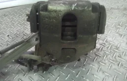 Суппорт тормозной Ford Fiesta 1478500, передний левый