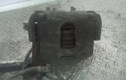 Суппорт тормозной Ford Fiesta 1478500, передний левый