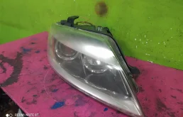 Фара ксенон левая для Audi Q7 2009 года на фотографиях