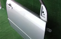 Дверь передняя левая для Toyota Corolla 2001 года на фотографиях