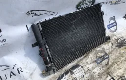 Радиатор кондиционера для Jaguar XF 2014 года на фотографиях