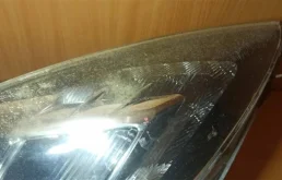 Фара ксенон левая для Opel Insignia 2013 года на фотографиях