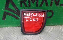 Отражатель Mitsubishi L200 2006-2015 8355A015 4, задний левый
