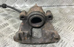 Суппорт передний левый Ford Focus 1 поколение [рестайлинг] (2001-2005) бензин 1.6 i Механика Х/б