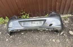 бампер задний opel astra j дорестаил