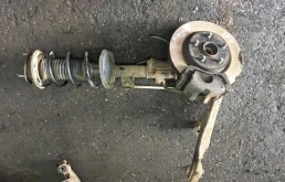 Суппорт передний левый для Suzuki Grand Vitara на фотографиях