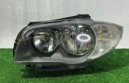 Фара левая BMW 1 2008 63117193389 E87