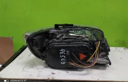 Фара ксенон левая для Audi Q7 2009 года на фотографиях