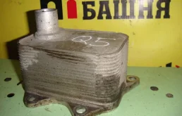 Радиатор масляный Audi Q3 06J117021J