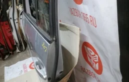 Дверь задняя левая для Volkswagen Touran 2009 года на фотографиях