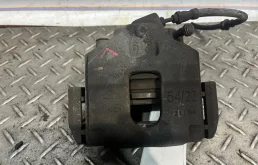 Суппорт тормозной Ford Fiesta 1478500 MK5, передний левый