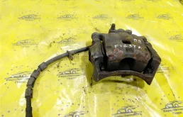 Суппорт тормозной Ford Fiesta 1766808 MK6, передний правый