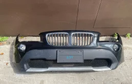 Передний бампер BMW X1 E84