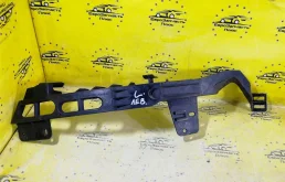Кронштейн бампера Opel Astra 13368880 J, левый