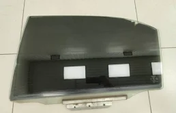 Стекло двери задней левой Toyota Corolla E120 2000-2007