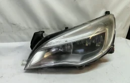 Фара Opel Astra 2011 13253646 J A14NET, левая
