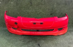Бампер Toyota Vitz 5211952010 SCP10