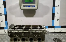 [Б/У] Головка блока VW Passat B6 Touran - без клапанов, задиры на бугелях распредвалов [Под ремонт] VAG 06D103351C