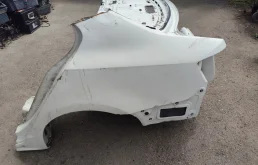 [Б/У] Заднее левое крыло VW Jetta VI 2011-2018 - В сборе. 5C6809843 - заднее левое крыло. Небольшая вмятина по арке колеса. 1K5813114 - ниша запаски. 5C6813301 - задняя панель [ХОРОШЕЕ] VAG 5C6809843