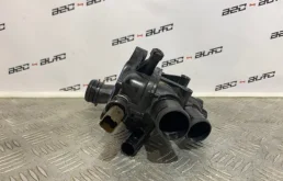 Корпус термостата системы охлаждения ДВС для Citroen C5 2012 года на фотографиях