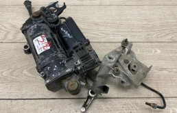 Компрессор пневмоподвески передний для Audi Q7 на фотографиях