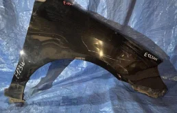 Крылья для Toyota Corolla 2003 года на фотографиях