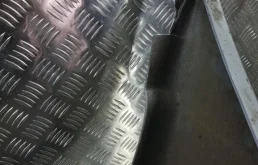 Бампер передний для Mitsubishi Pajero Sport 2006 года на фотографиях