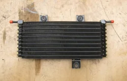 Радиатор АКПП для Nissan X-Trail 2007 года на фотографиях