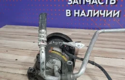 Компрессор кондиционера для Nissan Primera 1999 года на фотографиях