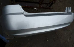 Бампер задний (0K2FA 50 220XX) для Kia Carens 1 FJ Rest 2002-2006