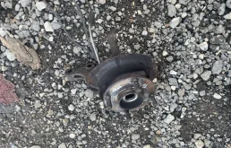 Кулак поворотный левый для Nissan Tiida SC11 Седан 2007-2014